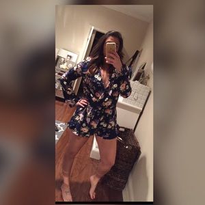 The Impeccable Pig blue floral romper size large